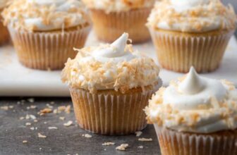 Almond Cupcakes with Coconut Frosti...